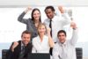 photodune-8235597-happy-business-team-celebrating-a-success-in-office-xs